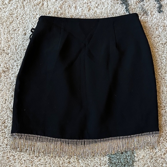 Cinq a Sept Black Mini Wrap Skirt with Rhinestone Trim - Picture 3 of 6